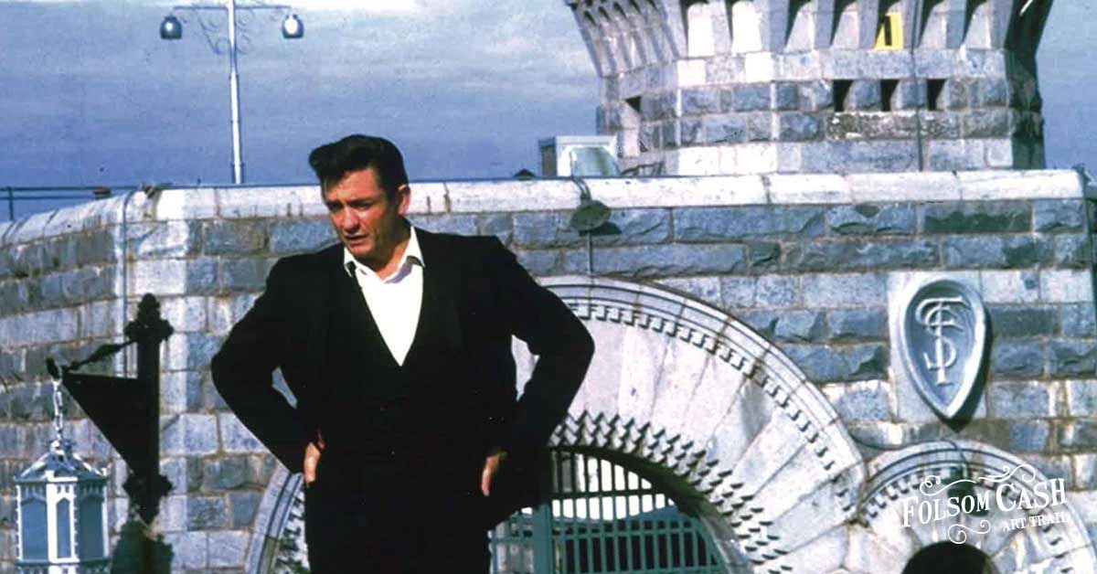 Johnny Cash Standing in Front of Folsom Prison