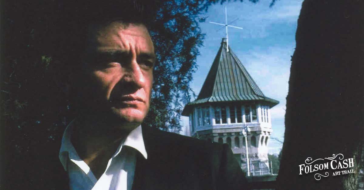 Johnny Cash Pictured in With Folsom Prison in Background